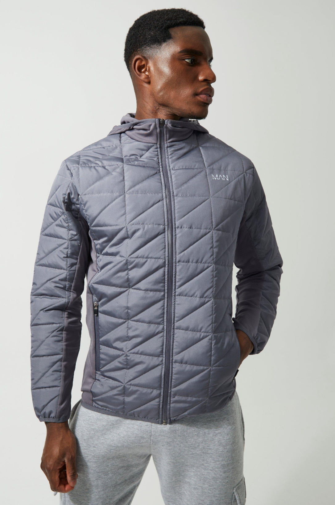 Man Active Hybrid Block Quilted Zip Through Hoodie